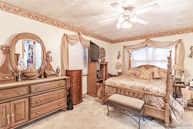 432756 E 320th Rd, Big Cabin, OK 74332 - bedroom featuring light carpet and ceiling fan