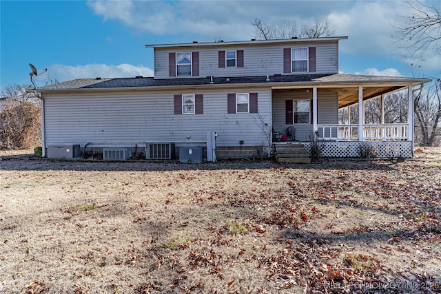 back of house featuring cooling unit and covered porch