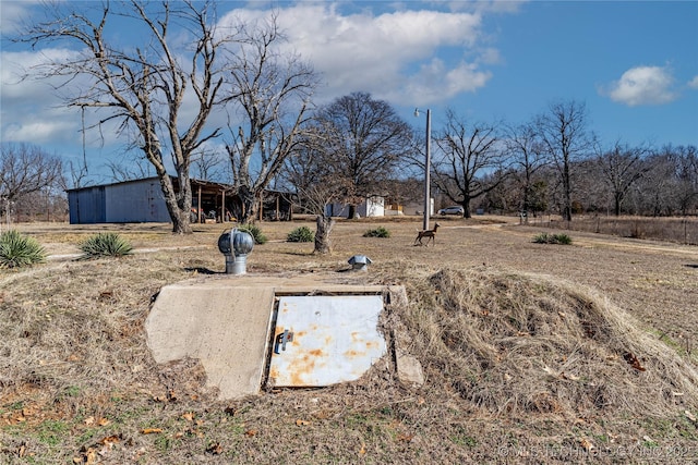 view of entry to storm shelter