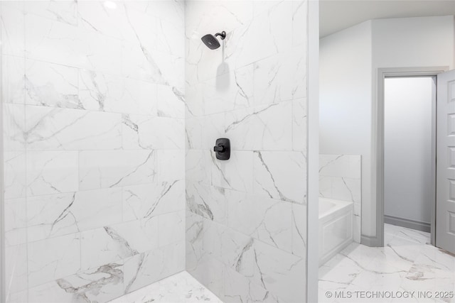 bathroom featuring separate shower and tub