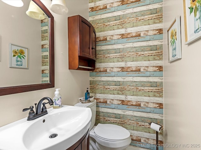 bathroom featuring sink and toilet