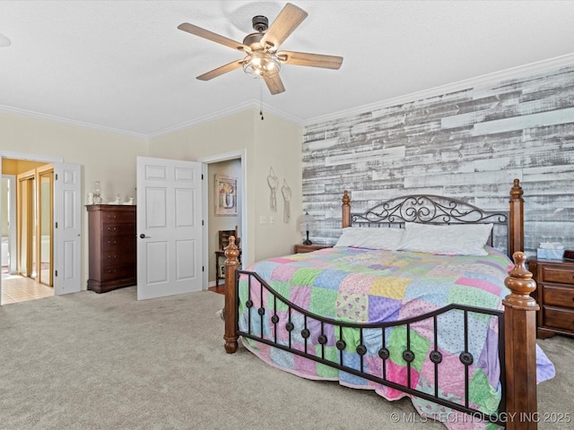 bedroom featuring crown molding, light colored carpet, ceiling fan, and wood walls