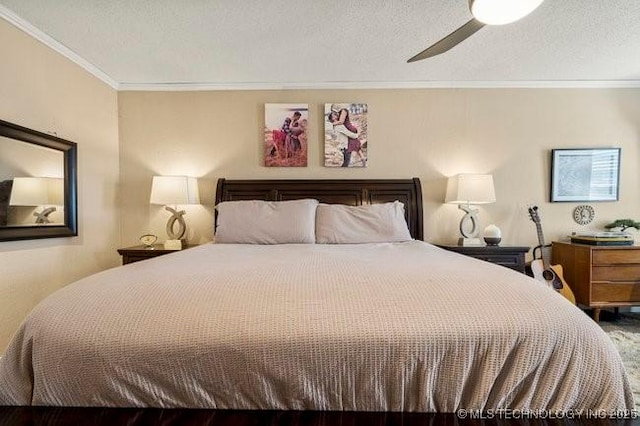 bedroom with ceiling fan, ornamental molding, and a textured ceiling