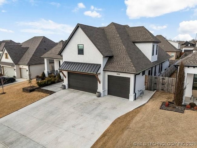 modern farmhouse style home featuring a garage