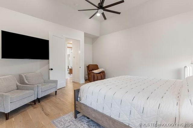 bedroom featuring light hardwood / wood-style floors and ceiling fan