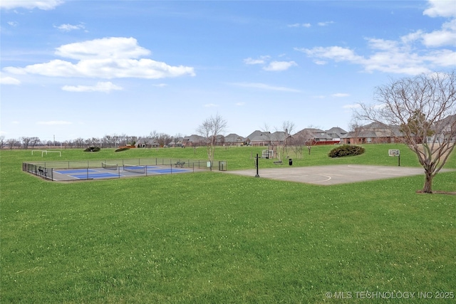 surrounding community featuring basketball court, a lawn, and tennis court