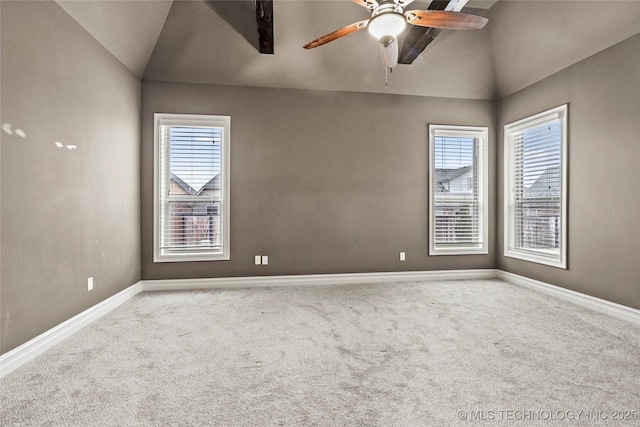 unfurnished room featuring lofted ceiling, light colored carpet, and ceiling fan