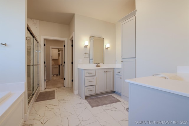 bathroom featuring independent shower and bath and vanity