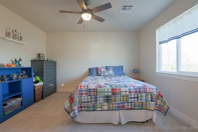 carpeted bedroom featuring ceiling fan