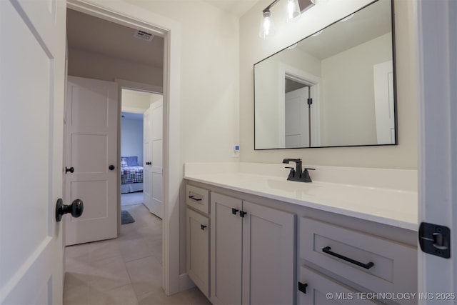 bathroom featuring vanity and tile patterned floors