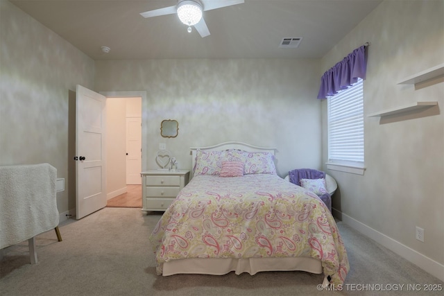 bedroom with light carpet and ceiling fan