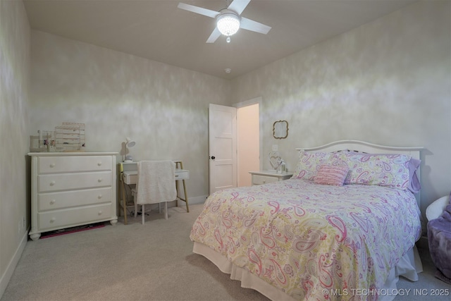 bedroom featuring light colored carpet and ceiling fan