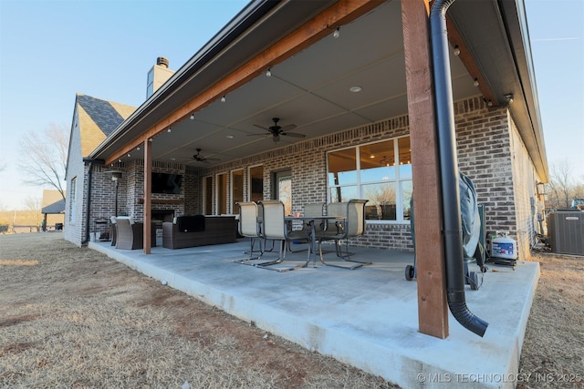 view of patio / terrace featuring central AC unit and ceiling fan