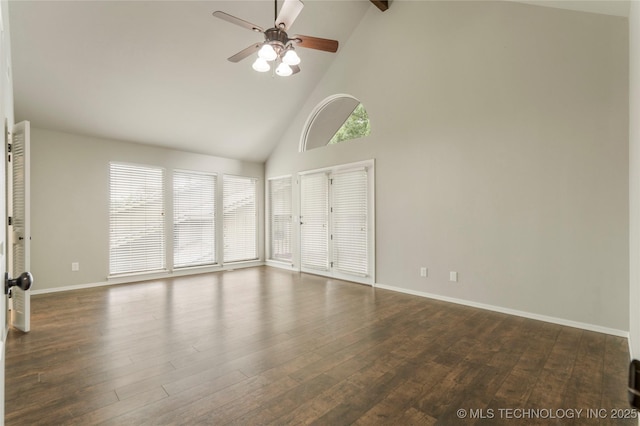 spare room featuring ceiling fan, dark hardwood / wood-style flooring, and high vaulted ceiling