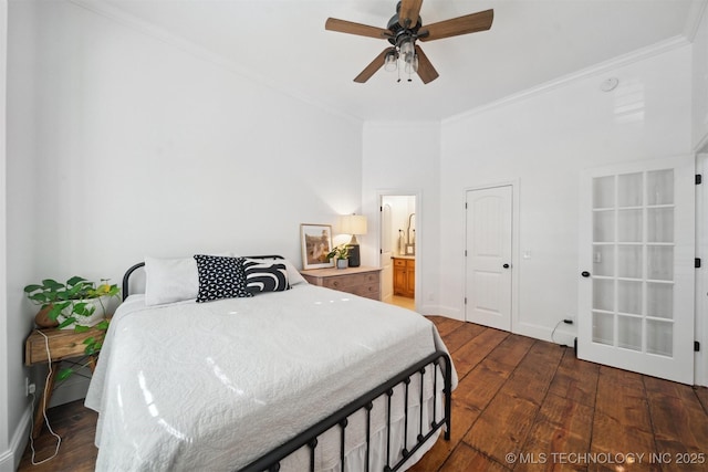 bedroom with ornamental molding, dark hardwood / wood-style floors, ensuite bathroom, and ceiling fan