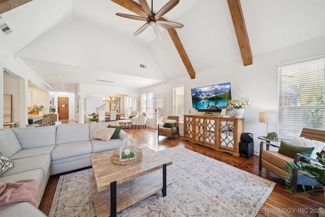 living room featuring beamed ceiling, plenty of natural light, high vaulted ceiling, and hardwood / wood-style floors