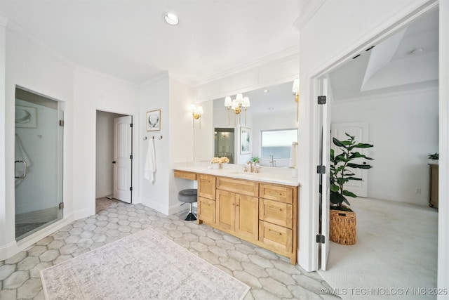 bathroom with ornamental molding, vanity, a chandelier, and walk in shower