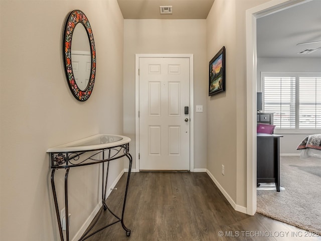 doorway featuring dark hardwood / wood-style flooring