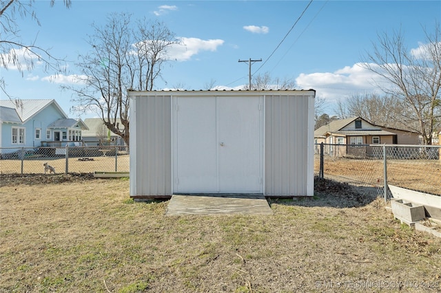 view of outdoor structure with a lawn