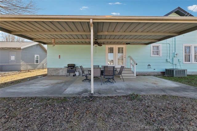 view of patio / terrace with central AC, french doors, and ceiling fan