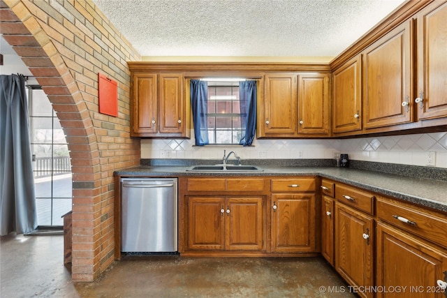 kitchen featuring sink, a textured ceiling, dishwasher, and backsplash