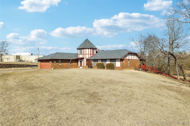 view of front of house with a front lawn