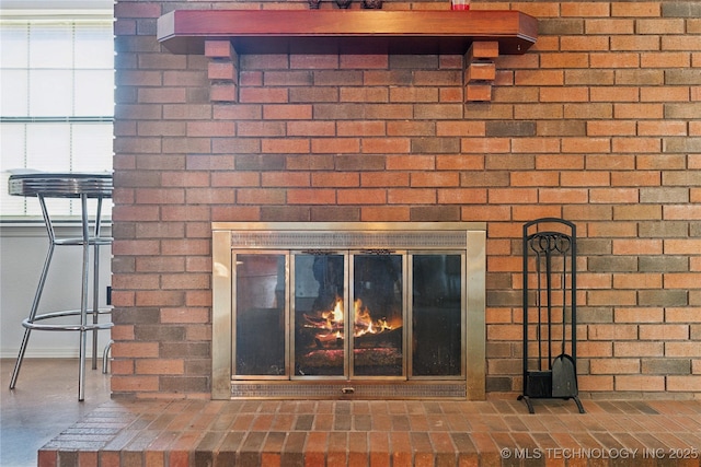 details with a brick fireplace