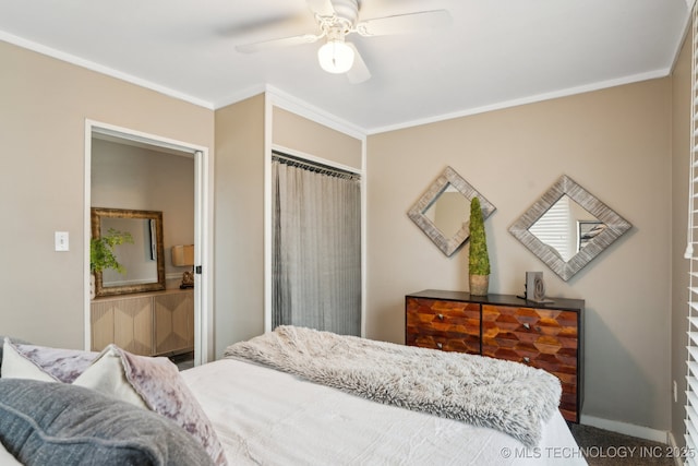 carpeted bedroom with crown molding, a closet, and ceiling fan