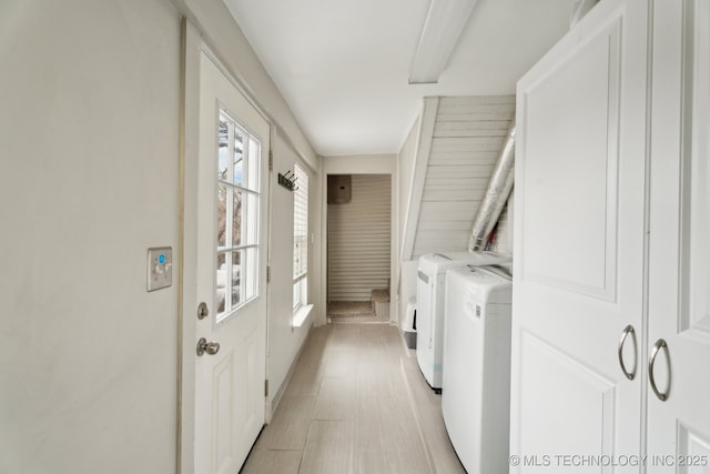 laundry room featuring washer and clothes dryer