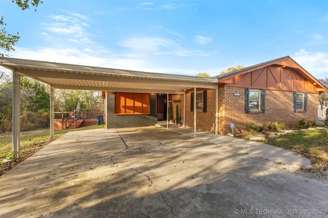 view of front of home with a carport