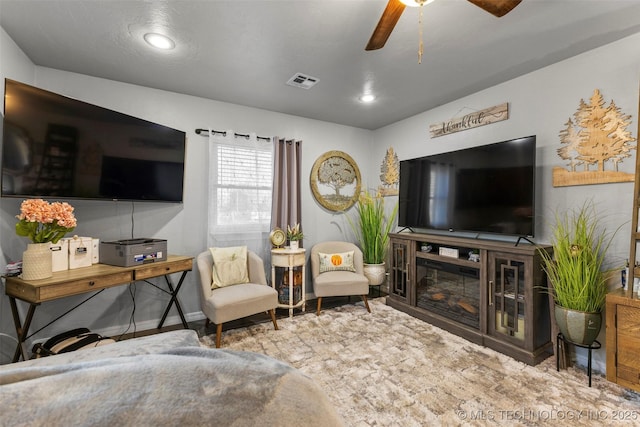 living room featuring ceiling fan