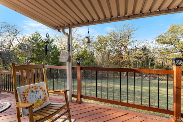 deck featuring a lawn