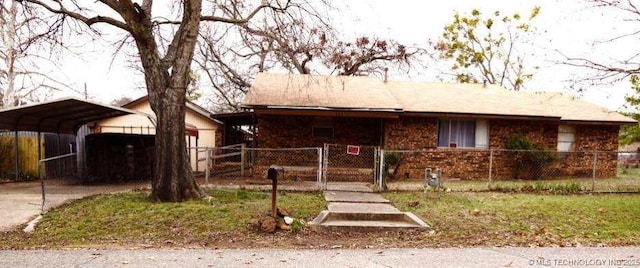 view of front of property featuring a carport