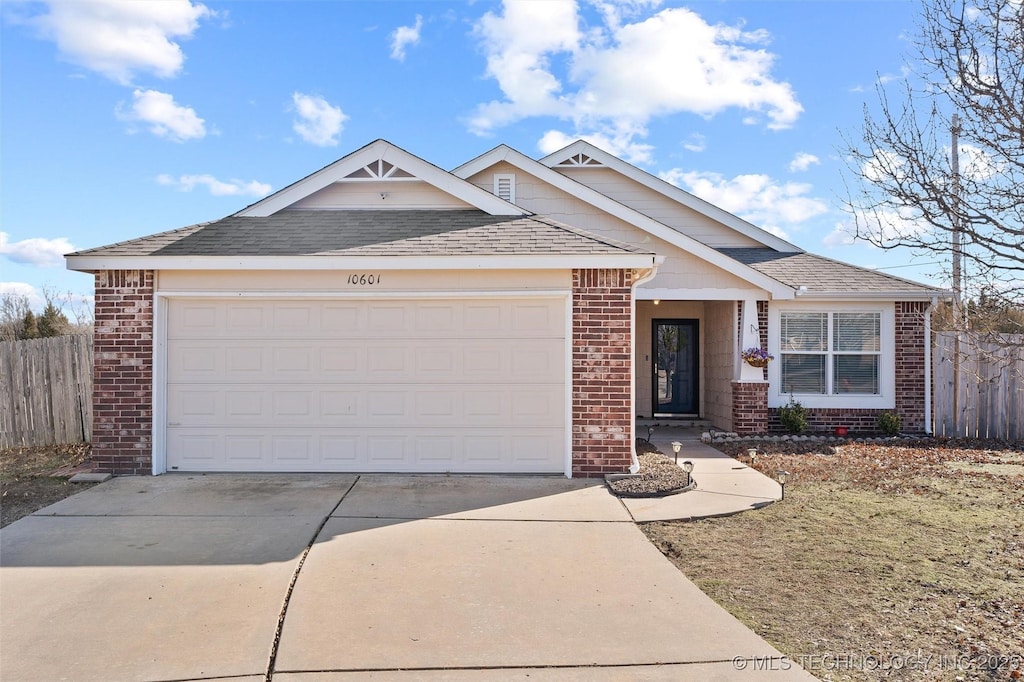 view of front of property with a garage