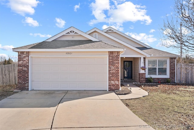 view of front of property with a garage