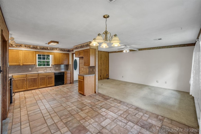 kitchen with sink, tasteful backsplash, hanging light fixtures, dishwasher, and light colored carpet