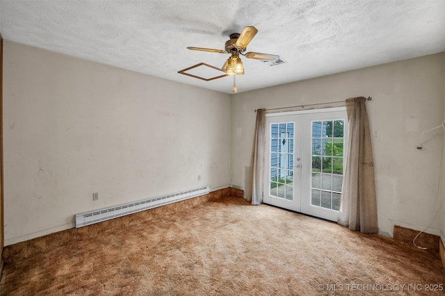 carpeted spare room featuring baseboard heating, ceiling fan, french doors, and a textured ceiling