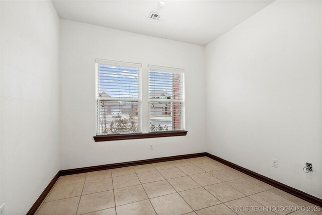 view of tiled spare room