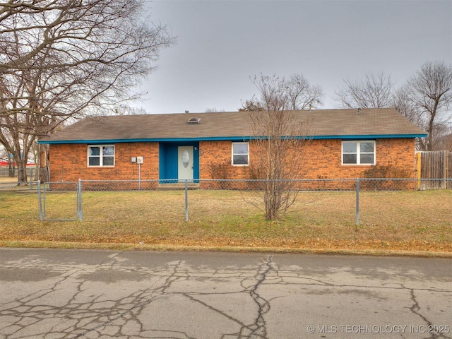 ranch-style house with a front lawn