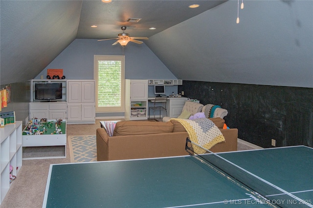 game room with light carpet, lofted ceiling, and ceiling fan