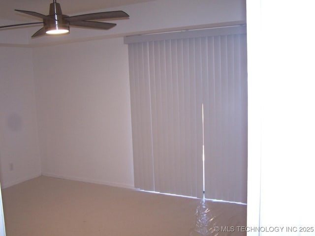 interior space featuring ceiling fan