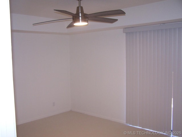 unfurnished room with ceiling fan