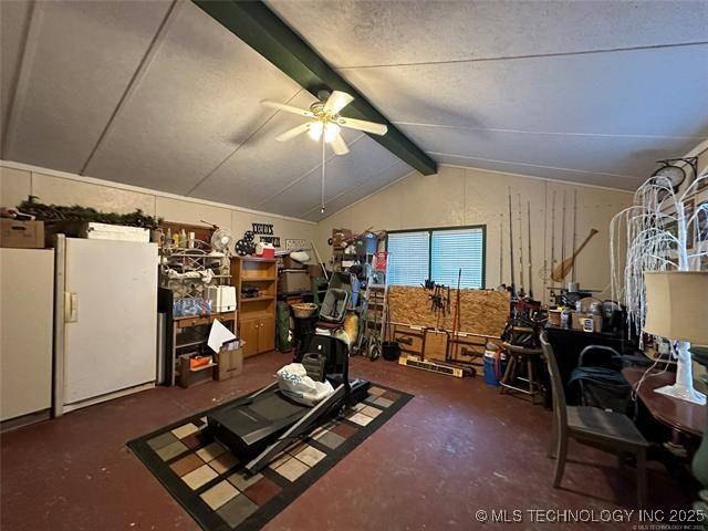 additional living space featuring lofted ceiling with beams and ceiling fan