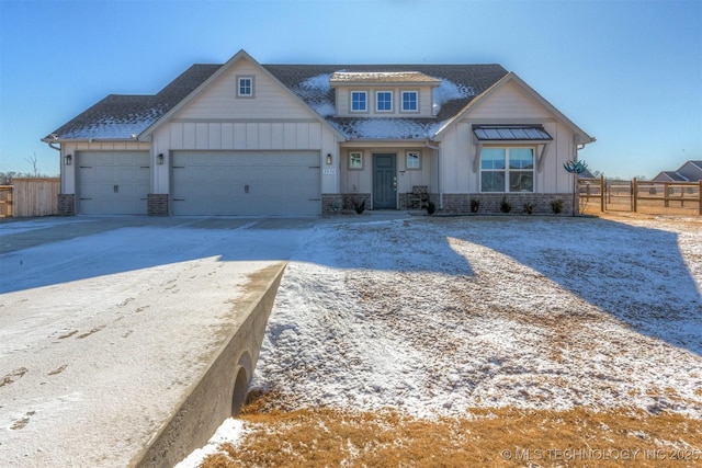 view of front of property with a garage