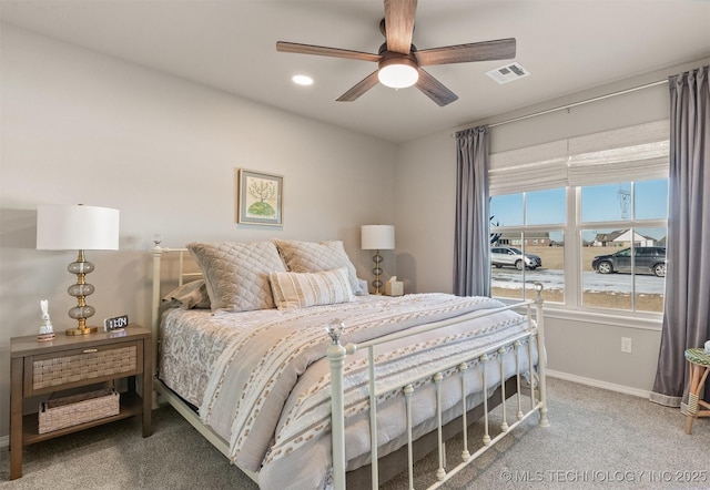 bedroom with ceiling fan and carpet flooring