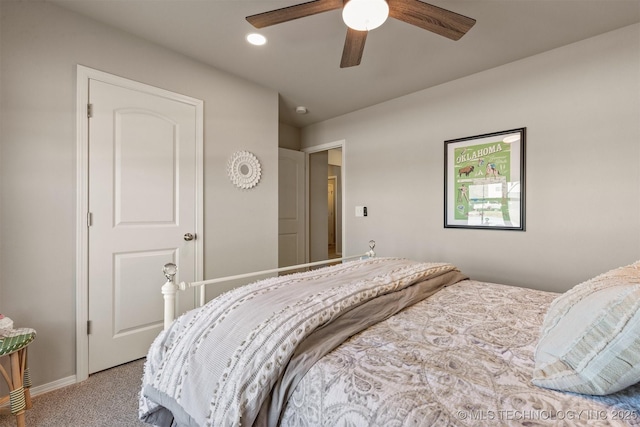 carpeted bedroom with ceiling fan