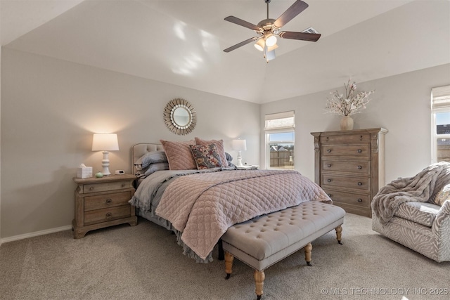 carpeted bedroom featuring ceiling fan and lofted ceiling