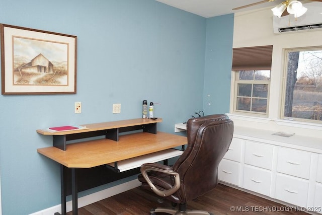 office space featuring a wall unit AC, dark hardwood / wood-style floors, and ceiling fan