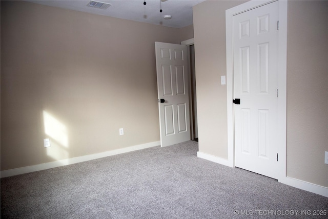 unfurnished bedroom featuring carpet floors