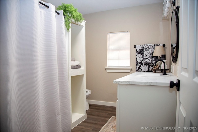 bathroom with vanity, wood-type flooring, toilet, and a shower with shower curtain